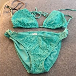 Teal bikini with cutout pattern